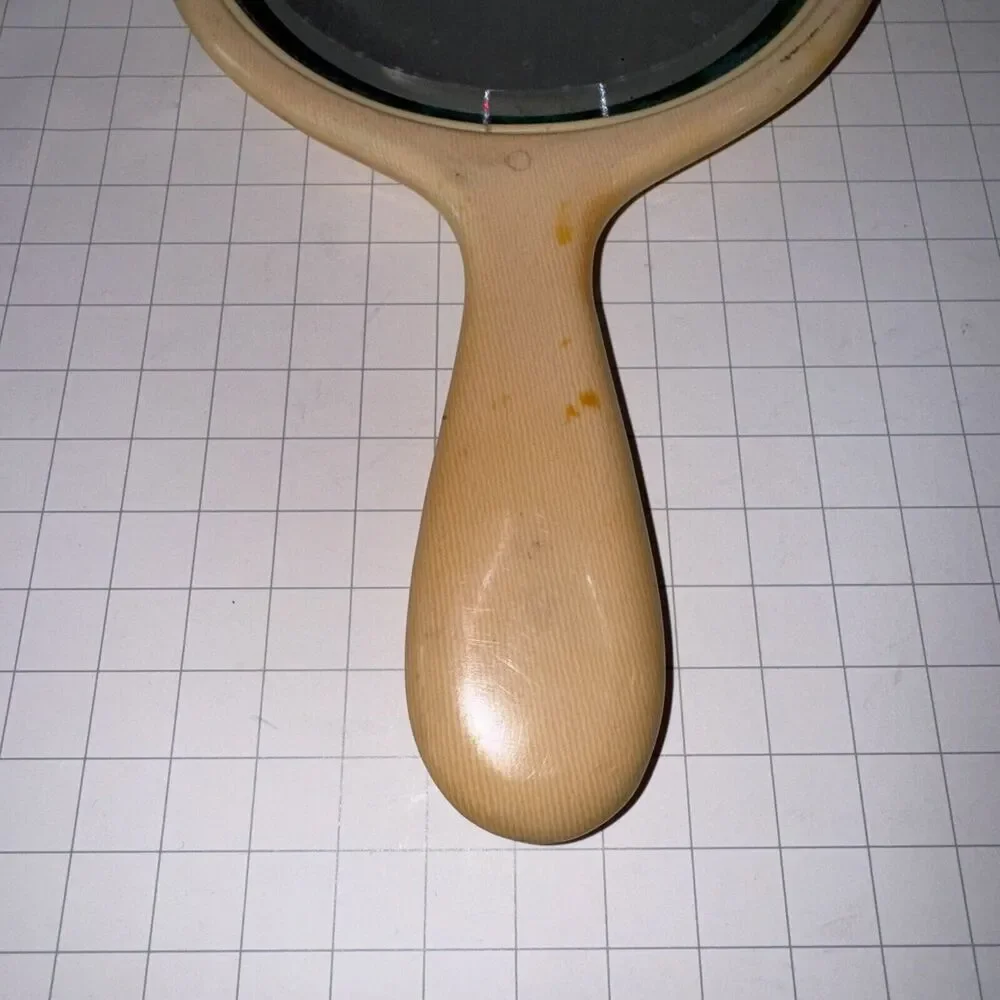 Vintage Art Deco Beveled Oval Celluloid Hand Mirror 9.5” approx Ivory Yellow